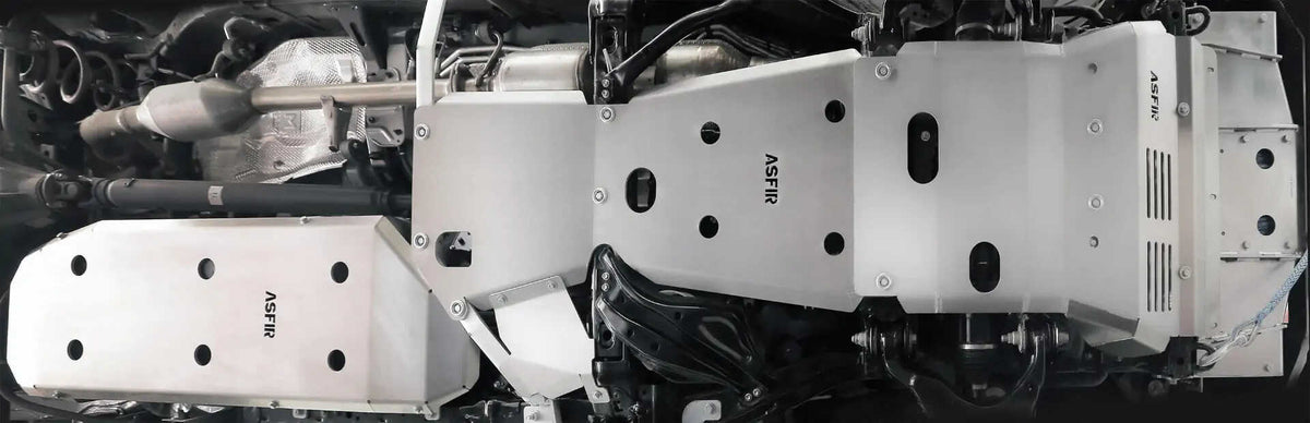 ASFIR 4x4 skid plates installed on a Jeep Wrangler and Toyota Land Cruiser navigating rocky terrain