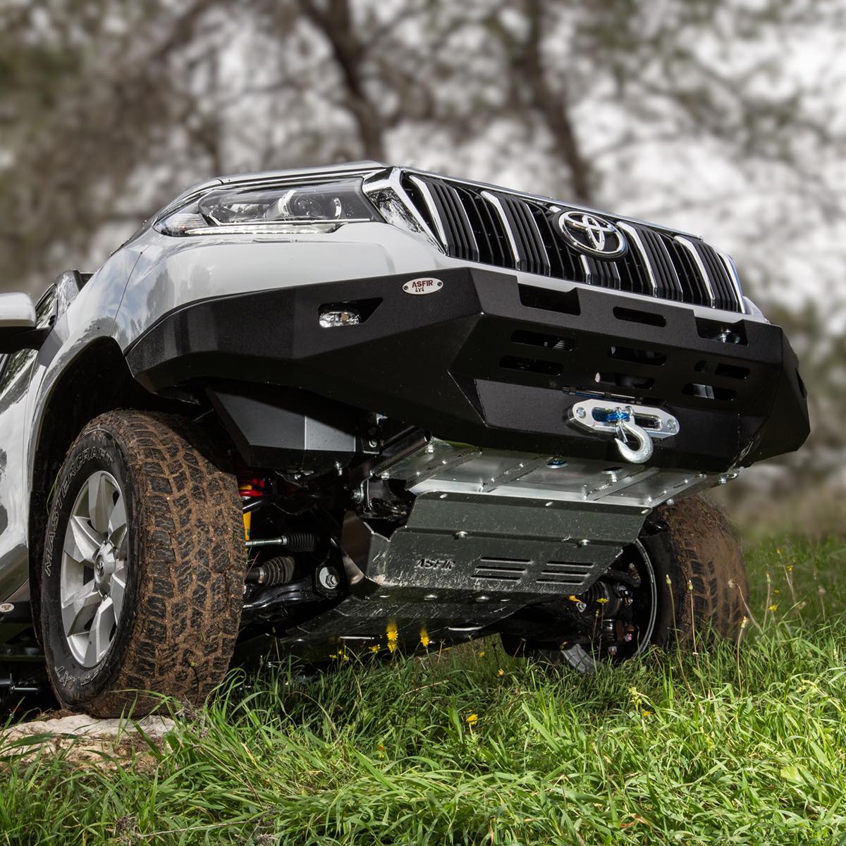 ASFIR 4x4 hidden winch mount installed inside OEM bumper on a Toyota Land Cruiser — 6mm zinc-coated steel, bolt-on fitment